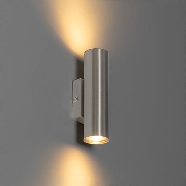 Zylindrische Wandleuchte aus Metall mit Lichtstrahlen nach oben und unten