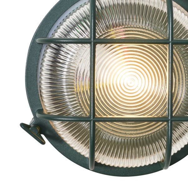 Runde Wandleuchte mit Metallgitter und geripptem Glas, beleuchtet