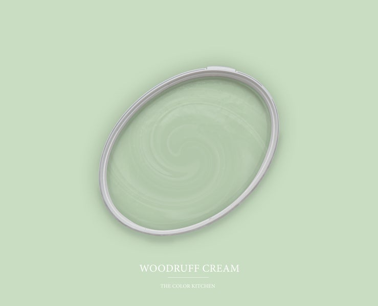 Wandfarbe Woodruff Cream von The Color Kitchen in einem ovalen Farbeimer