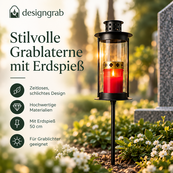 Designgrab Grablaterne mit Erdspieß aus Metall mit brennender Grabkerze auf einem Friedhof.