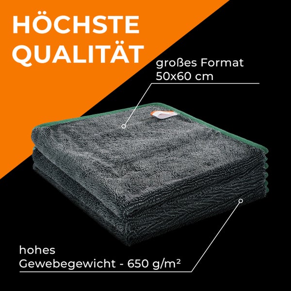 Mikrofasertuch in Dunkelgrau mit grünem Rand, Format 50 mal 60 Zentimeter, hohes Gewebegewicht von 650 Gramm pro Quadratmeter.