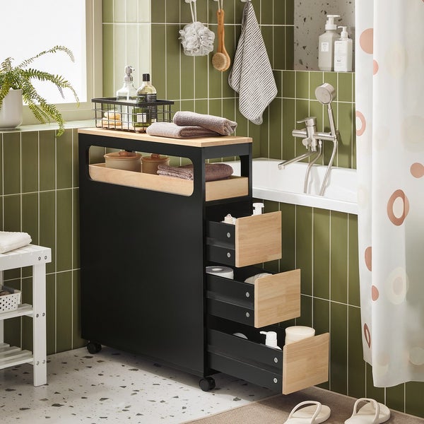 Badezimmer mit schwarzem Rollcontainer, Ablageflächen und Schubladen zur Aufbewahrung von Badutensilien