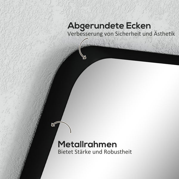 Badezimmer mit einem Waschtischunterschrank in dunkler Holzoptik, Marmorplatte und zwei Spiegeln