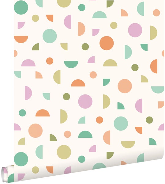 Tapete mit geometrischem Muster aus Kreisen und Halbkreisen in verschiedenen Pastelltönen.