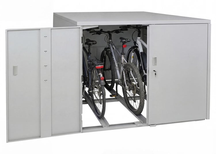 Abschließbare Mülltonnenbox aus Metall mit zwei Türen, eine Tür geöffnet, Innenrahmen sichtbar.