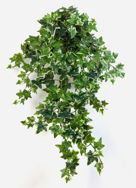 Künstlicher Magnolienzweig mit naturgetreuen Blüten in Weiß und Rosa sowie Knospen an einem braunen Ast.