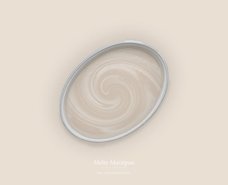 Wandfarbe Melty Marzipan von The Color Kitchen in einem ovalen Farbeimer mit einer Farbmischung in Wirbelform.