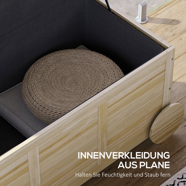 Geöffnete Aufbewahrungsbox aus Holz mit Innenfutter und Kissen