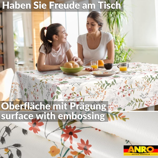 Abwaschbare Tischdecke mit Blumenmuster und geprägter Oberfläche an einem Esstisch mit einer Familie. ANRO Logo.