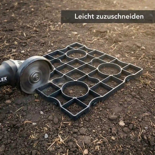 Winkelschleifer schneidet ein Rasengitter aus Kunststoff auf dem Boden