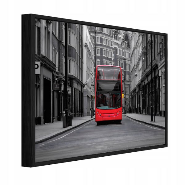 Wandbild mit Motiv eines roten Doppeldeckerbusses in einer schwarz-weißen Londoner Straßenkulisse im schwarzen Rahmen