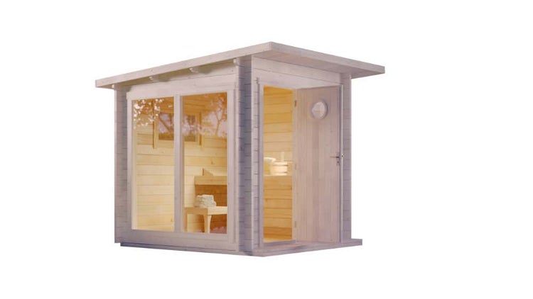 Moderne Gartensauna aus hellem Holz mit Pultdach, großen Fensterelementen und einer Holztür mit rundem Fenster.