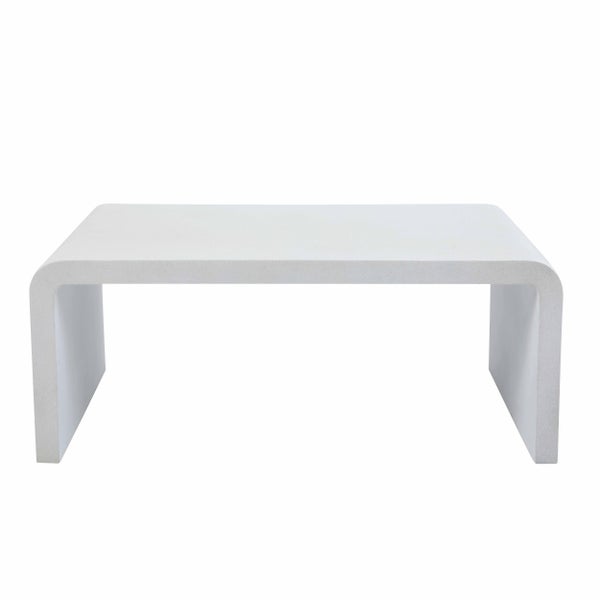 U-förmiger Beistelltisch aus hellem Faserzement in minimalistischem Design.