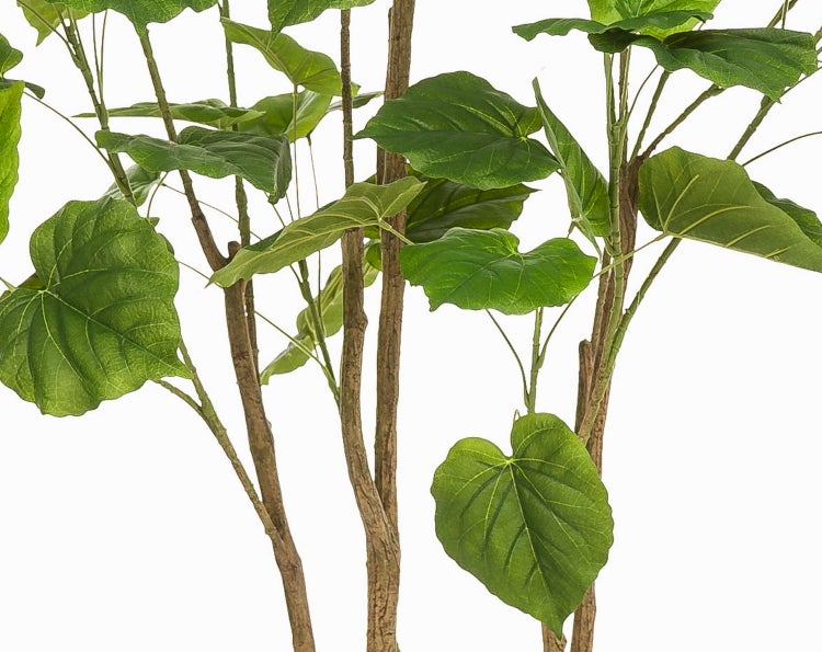 Künstlicher Zitronenzweig mit grünen Blättern, gelben Früchten und weißen Blüten.