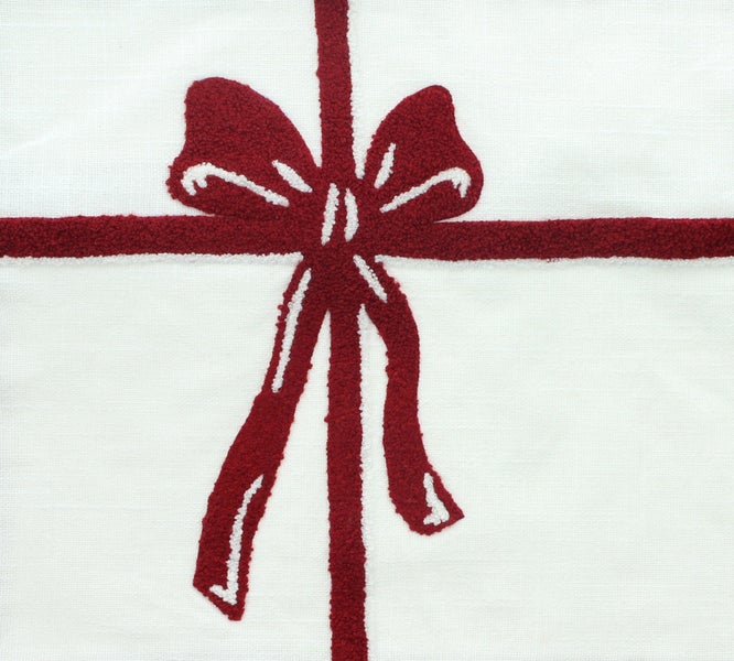 Dekorative Stoffserviette mit Schleifenmotiv
