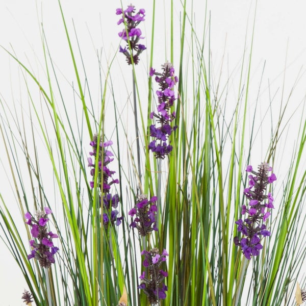 Künstliche Ranunkel in Pink und Lila mit grünem Stiel und Blättern.