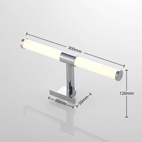 Moderne LED Badezimmer Wandleuchte aus Chrom mit Maßen Breite 300 Millimeter, Höhe 120 Millimeter, Basis 80 mal 50 Millimeter.