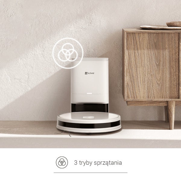 EZVIZ Staubsaugerroboter mit Absaugstation neben einem Holzschrank