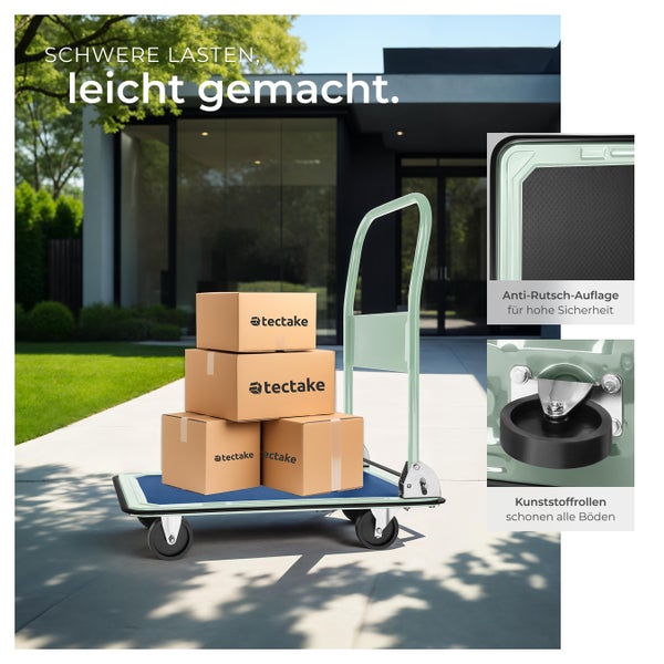 Transportwagen mit Kartons vor einem Haus