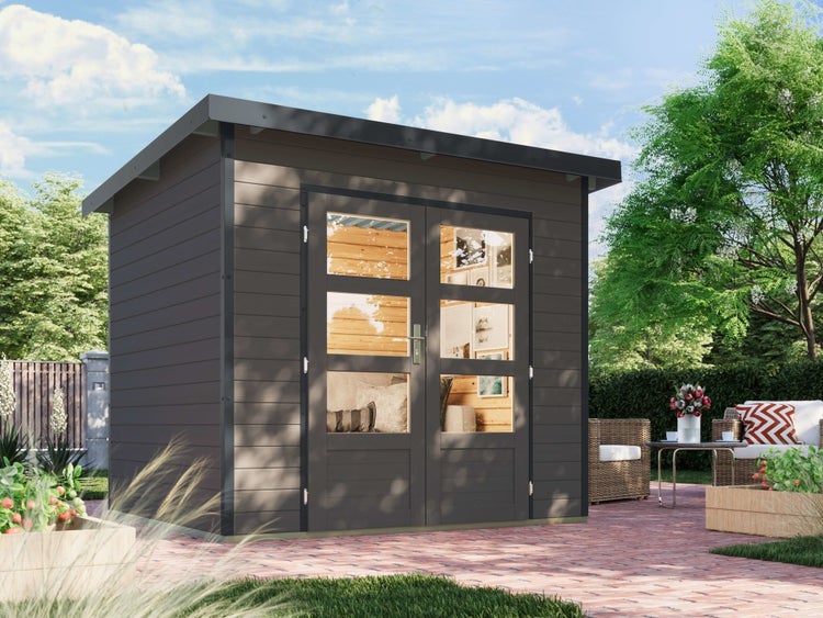 Modernes Gartenhaus aus Holz in Anthrazit mit Pultdach und verglaster Doppeltür auf einer gepflasterten Terrasse im Garten.