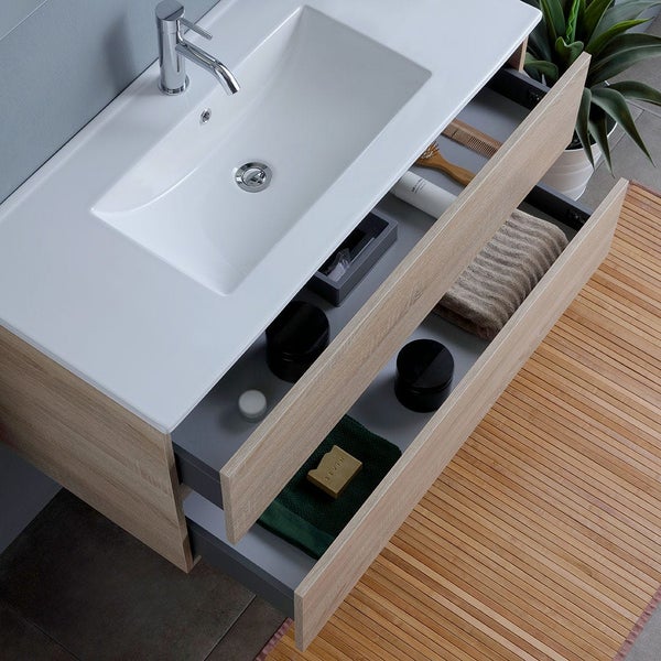 Badezimmerwaschtisch mit geöffneten Schubladen zur Aufbewahrung von Badutensilien