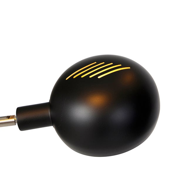 Detailaufnahme einer schwarzen Kugellampe mit Lichtschlitzen