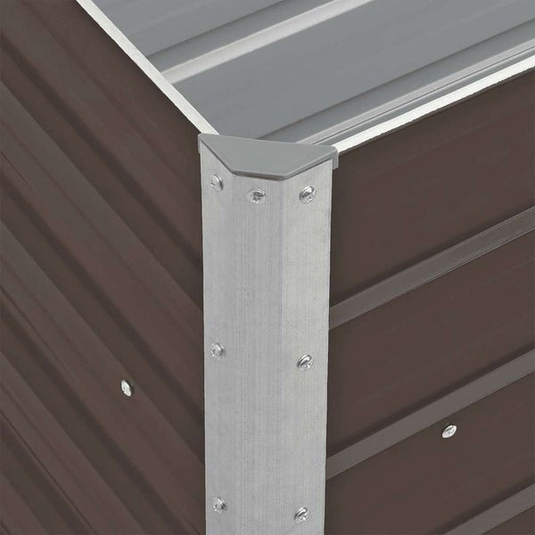 Eckverbindung eines Metall-Hochbeets mit verzinktem Eckprofil, Schraubverbindungen und Kunststoffkappe.