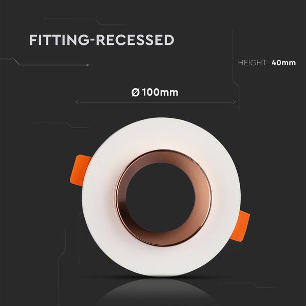 Runder Einbaustrahler, Durchmesser 100 Millimeter, Höhe 40 Millimeter, mit weißem Außenring und kupferfarbenem Innenring.