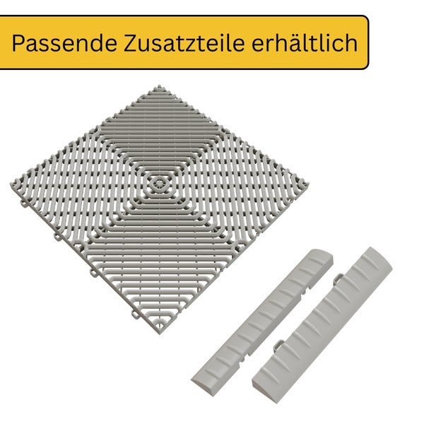 Graue Kunststoff-Bodenfliese mit Gittermuster und passenden Randstücken. Passende Zusatzteile erhältlich.