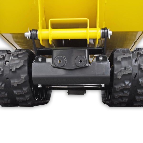 Detailansicht eines gelben Dumper-Anhängers mit schwarzen Reifen