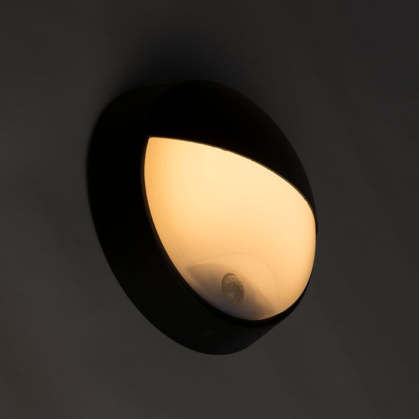 Runde LED-Außenwandleuchte mit Bewegungsmelder, Schwarz, warmweiß leuchtend