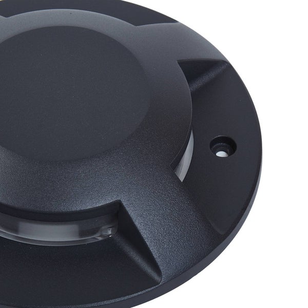 Runde schwarze Bodenleuchte für den Außenbereich zur Montage auf dem Boden.