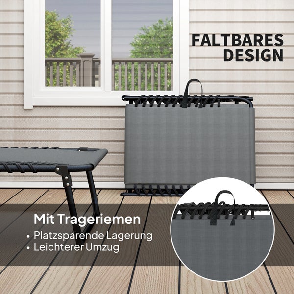 Gartenszene mit Liegestuhl, Beistelltisch, Pflanzen und Dekoration für entspannte Atmosphäre