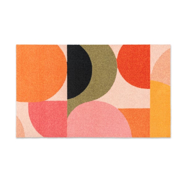 Schmutzfangmatte mit buntem geometrischem Muster aus Kreisen und Halbkreisen.