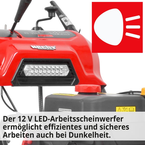 Detailansicht einer Schneefräse mit LED-Arbeitsscheinwerfer und rotem Scheinwerfer Symbol