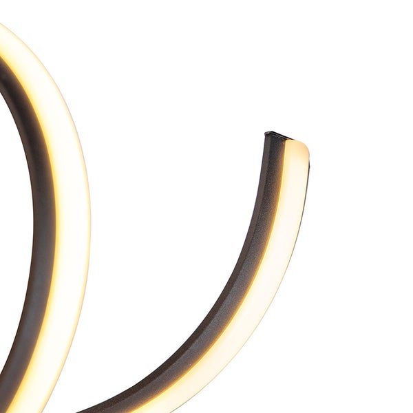 Detailaufnahme einer geschwungenen LED-Leuchte