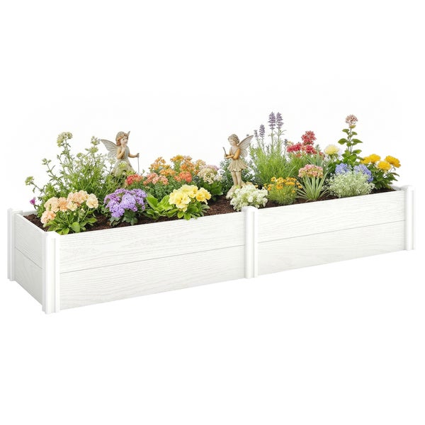 Weißer rechteckiger Pflanzkasten aus Holz mit verschiedenen Blumen und zwei dekorativen Feenfiguren.