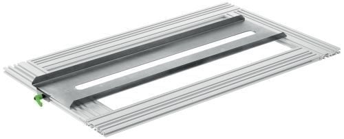 Wohnzimmer mit Sofa und Teppich mit Blattmuster