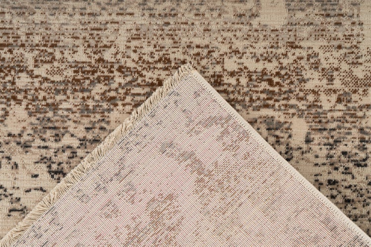 Beiger Teppich mit Vintage-Muster, Detailansicht der Rückseite und Fransen.