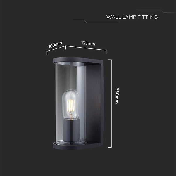 Wandleuchte in Schwarz mit Glaszylinder, Breite 135 Millimeter, Höhe 230 Millimeter, Tiefe 100 Millimeter.