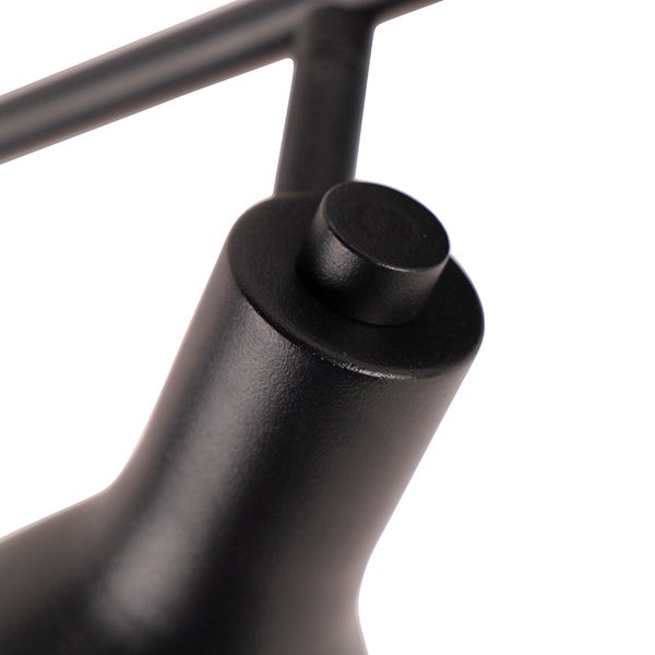 Detailaufnahme einer schwarzen Lampe mit Einstellknopf
