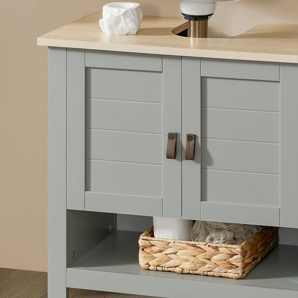 Badezimmerschrank mit zwei Türen, Ablage und geflochtenem Korb