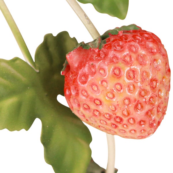 Dekorative Erdbeere mit Blättern für den Innenbereich