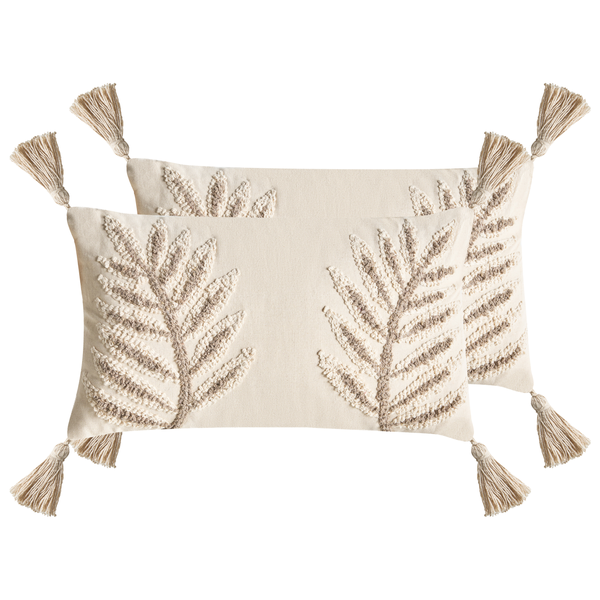 Zwei dekorative Kissen mit Quasten und Pflanzenmuster