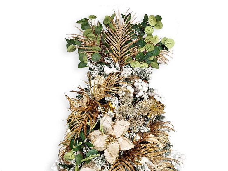 Weihnachtsbaumspitze mit künstlichen Blättern, Blumen, Schmetterling und Glitter-Akzenten für eine festliche Weihnachtsdekoration.