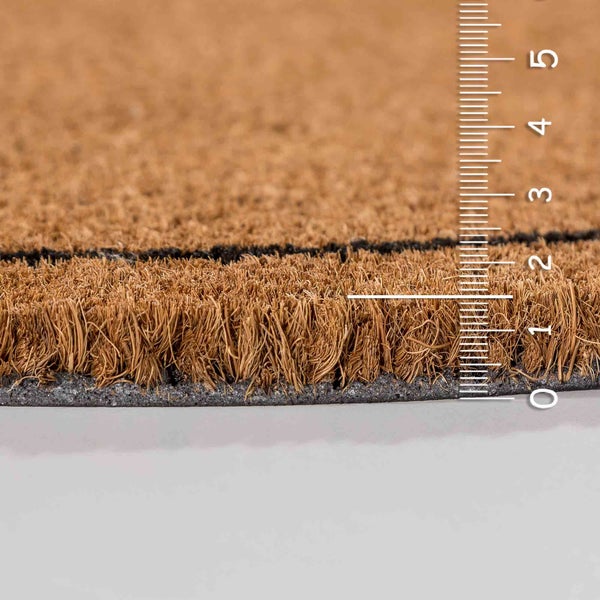 Kokosmatte mit Messskala zur Bestimmung der Dicke