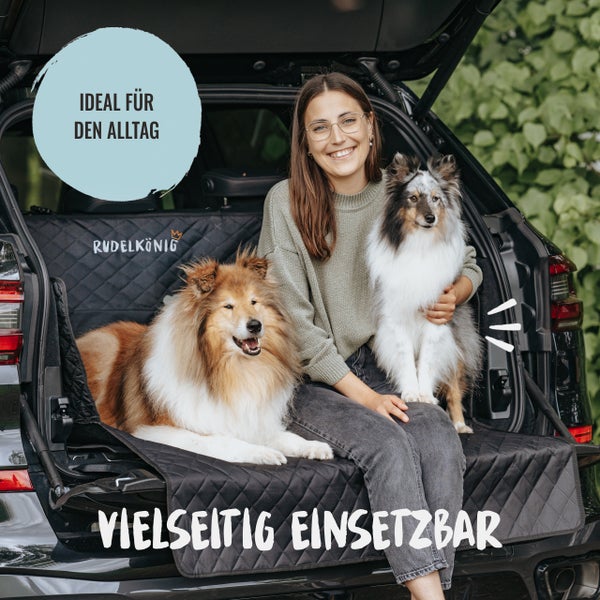 Rudelkönig Kofferraumschutzdecke mit Frau und zwei Hunden im Kofferraum