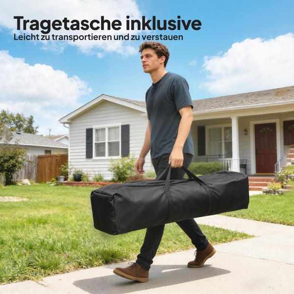 Ein Mann trägt eine große schwarze Tragetasche vor einem Haus. Inklusive Tasche für einfachen Transport und platzsparende Lagerung.