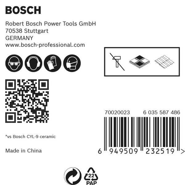 Nahaufnahme einer Bohrmaschine beim Bohren in eine Fliese