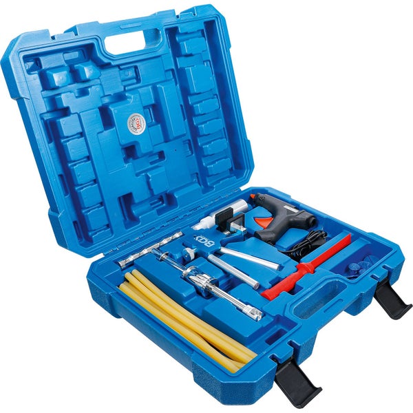 Werkzeugsatz zur Ausbeulung in einem blauen Werkzeugkasten